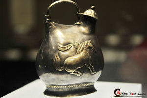 Gilded Silver Flask with Dancing Horses Holding Cups in Their Mouths, Tang Dynasty (618-907 AD)