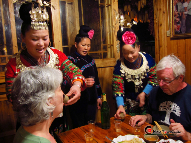 guizhou miao toasting to visitors