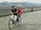 Cycling on ancient wall