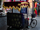 Happy rickshaw tour through Hutong