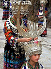 Miao girls preparing for the festival