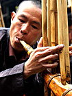 Blowing Lusheng by Dong people