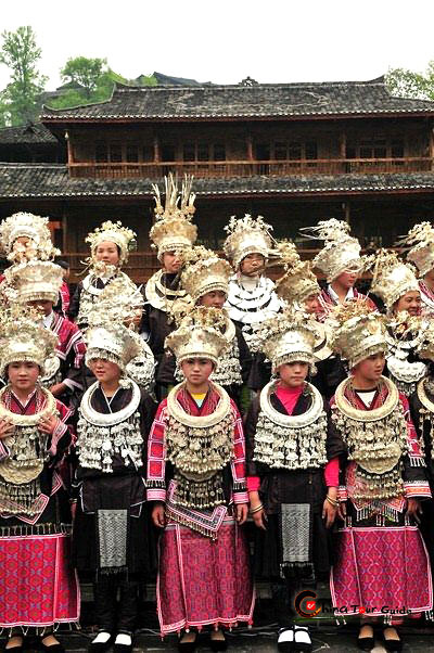 A Chinese villager of Miao ethnic group wearing traditional costumes  practises ''Miao stickfighting'', a unique martial art of the Miao Martial  Arts i Stock Photo - Alamy